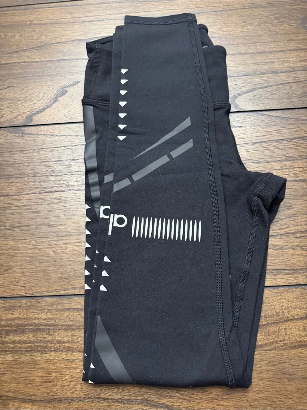 ALO Yoga Black Leggings with Subtle Reflective Accents